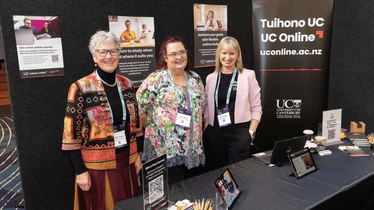 Moira Fraser, Lulu Barry and Lisa Burdes showcasing Tuihono UC | UC Online at the PMINZ 2025 Conference