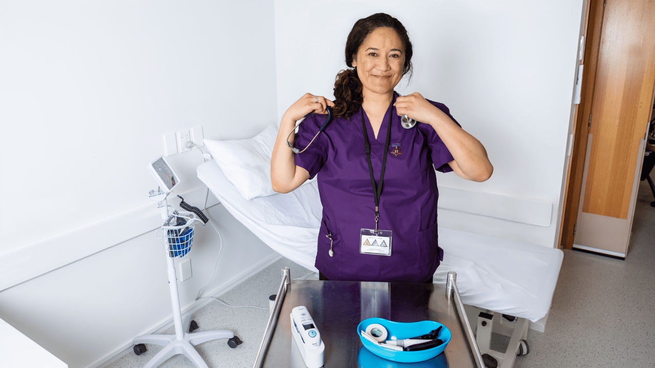 Nurse prescriber preparing a tray to treat a patient, after upskilling to become a registered nurse prescriber with UC Online