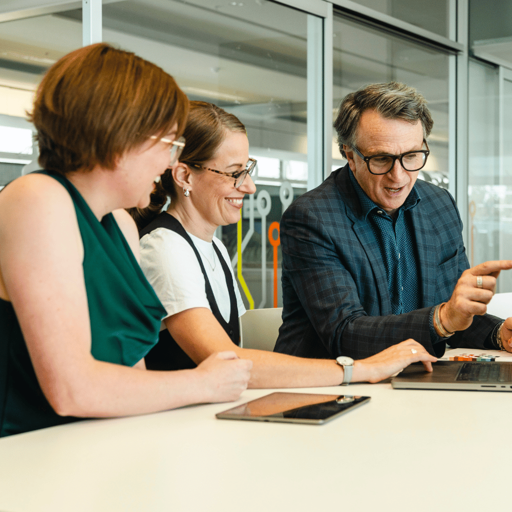 Group of learners discussing the four core courses in their Master of Project Management program.