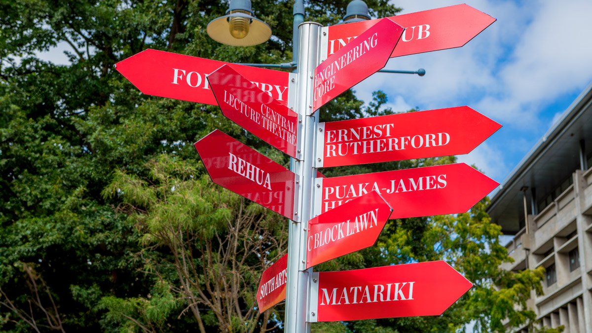 Post with red directional signs pointing to buildings on UC's campus, with labels such as 'Matariki', 'C Block Lawn', Engineering Core', 'Rehua', and many more.