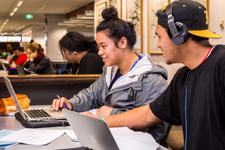 Students studying on laptop