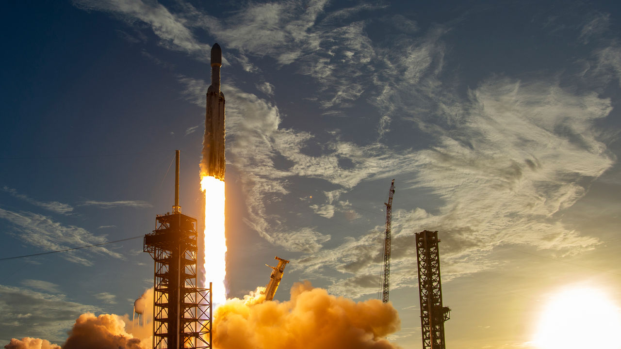 Space telescope launch via a rocket