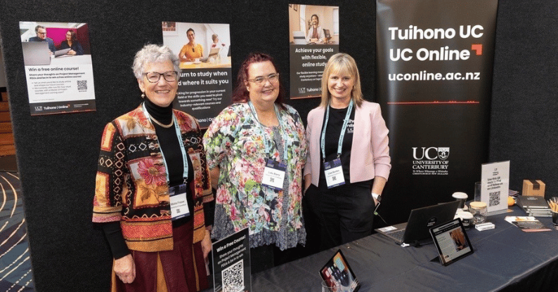 Moira Fraser, Lulu Barry and Lisa Burdes promoting Tuihono UC | UC Online at the 2025 PMINZ Conference.