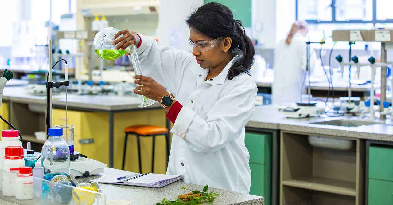 UC researcher Dr Pram Abhayawardhana working in a laboratory