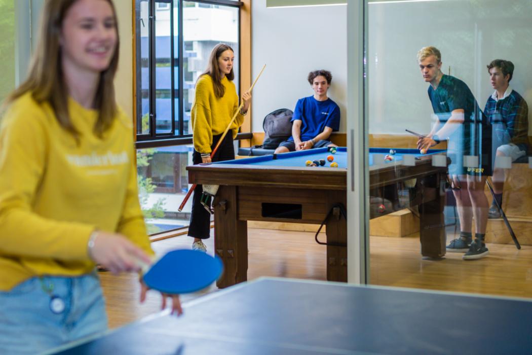 Students socialise at the pool and table tennis tables at Rochester and Rutherford Hall Students socialise at the pool and table tennis tables at Rochester and Rutherford Hall