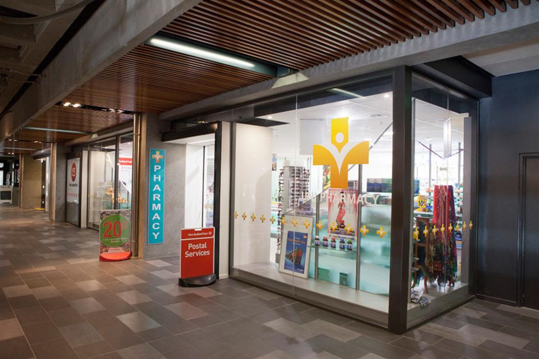 Outside the UNiversity of Canterbury's campus  pharmacy at the Undercroft in the evening.