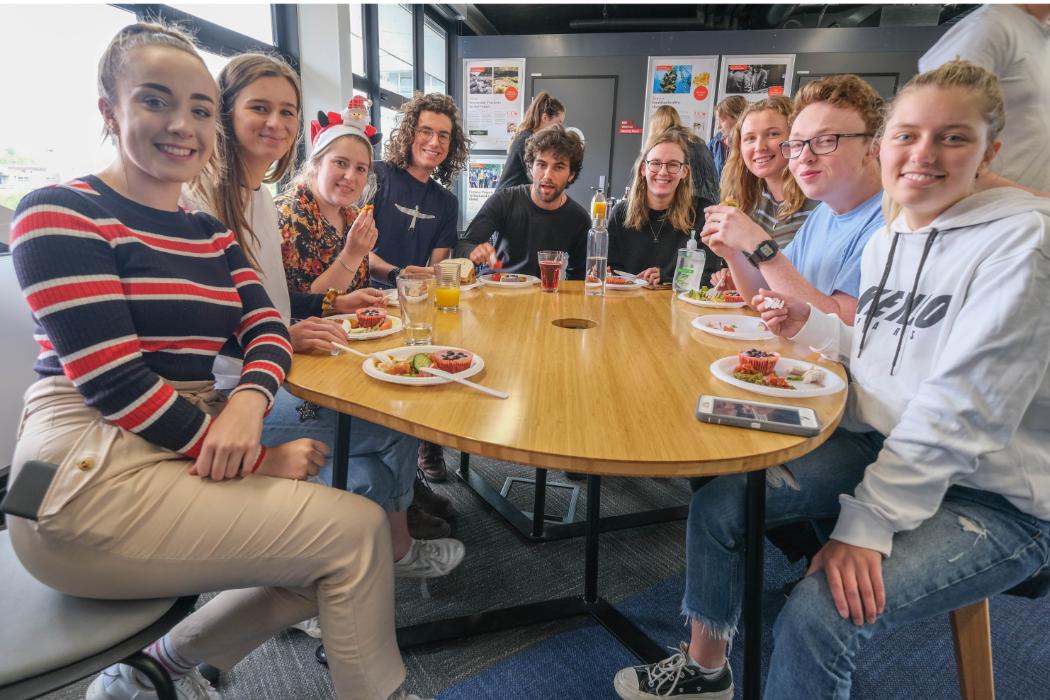 Students enjoy a Christmas potluck on the last day of the programme for 2019.