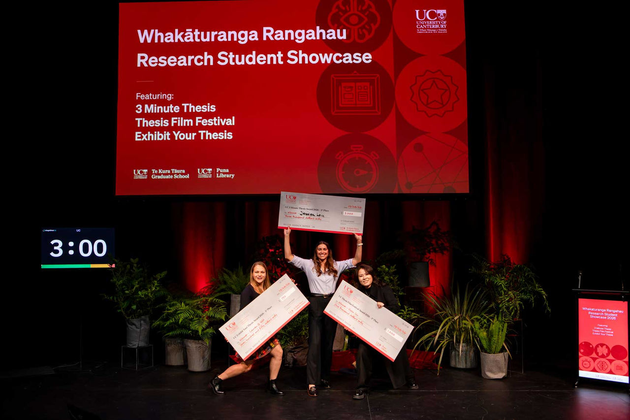 Research Student Showcase 2026 winners holding giant cheques