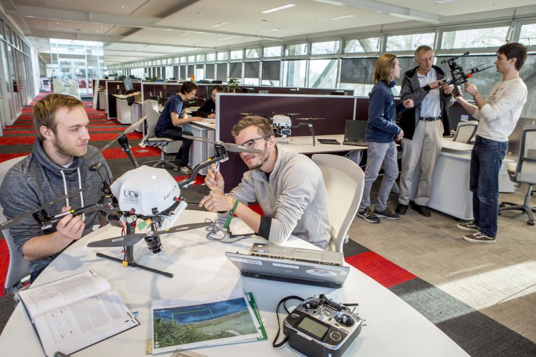 Students working on a drone