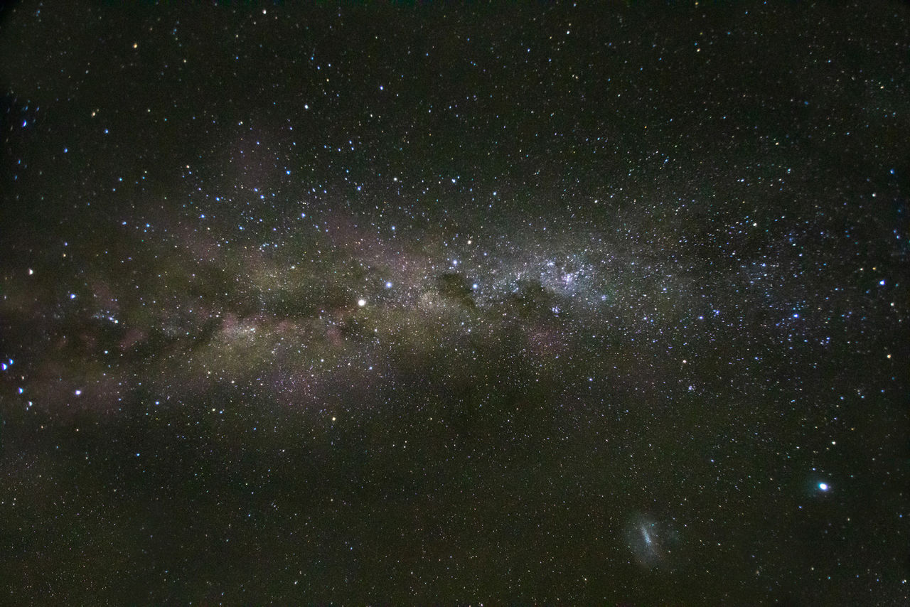 Night sky with the Milky Way visible amongst stars.