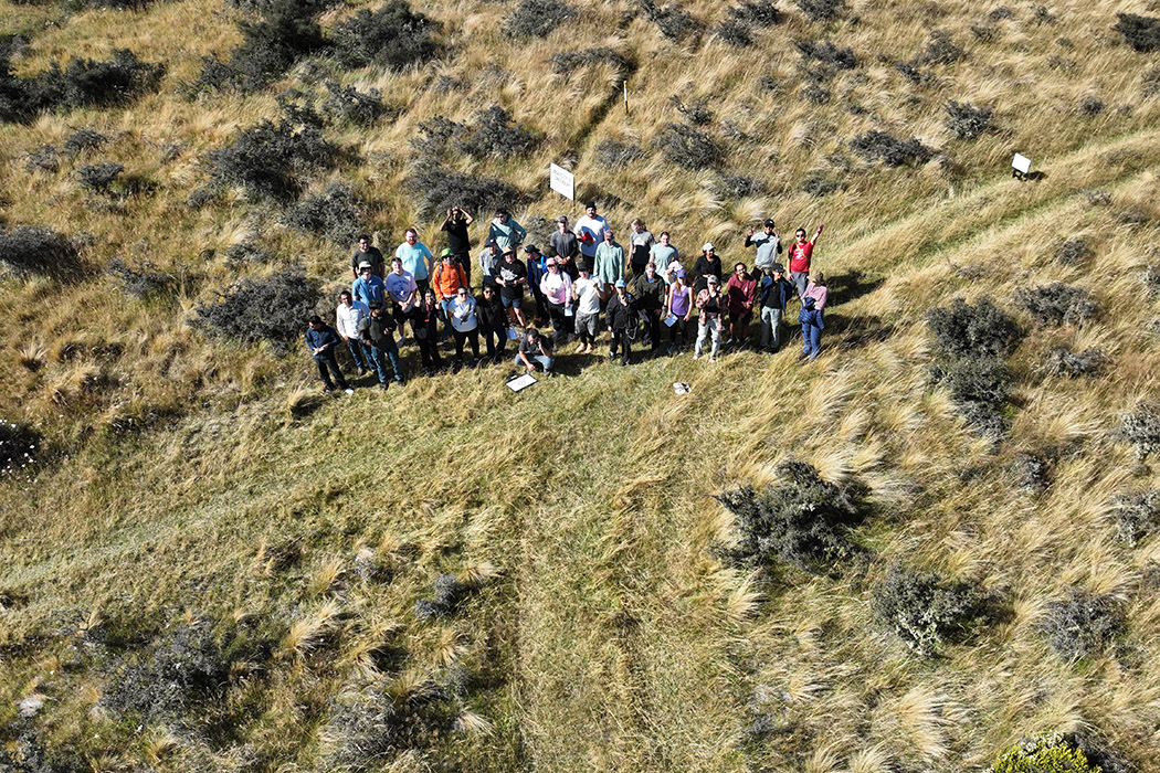 UC students conducting a geospatial data survey of a lake.