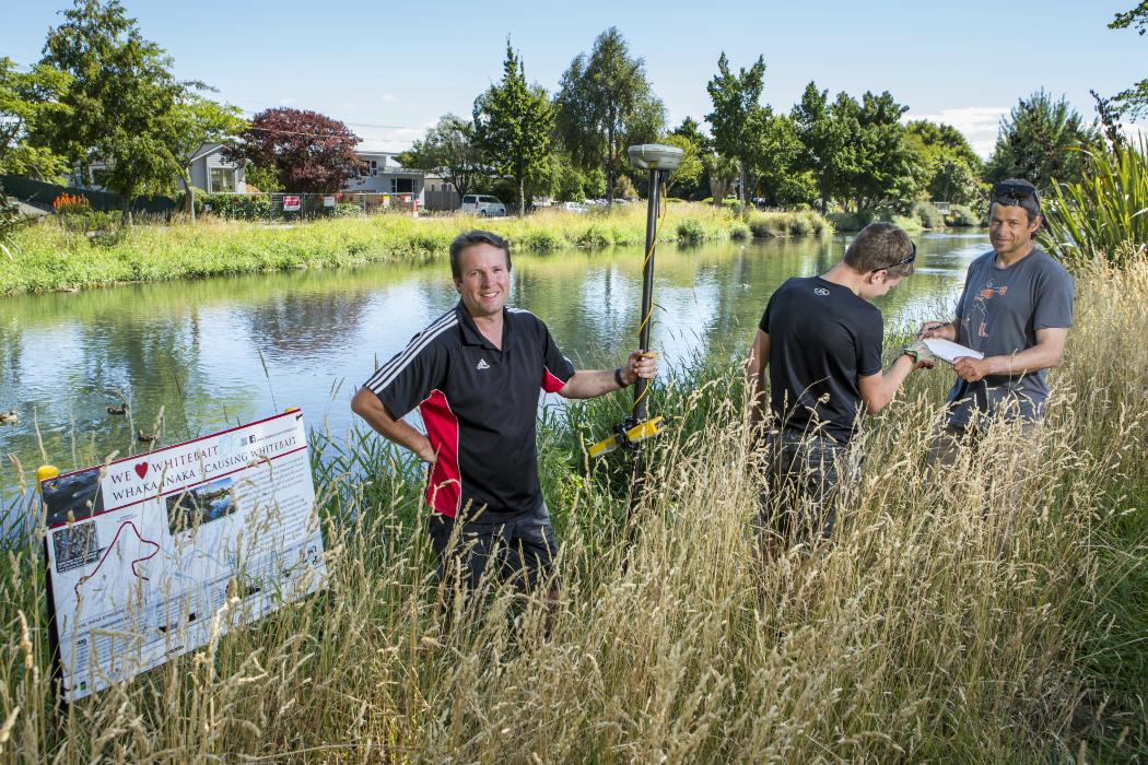 Dr Mike Hickford (left), his son Blake and doctoral researcher Shane Orchard on the banks of the Ōpāwaho Heathcote River.