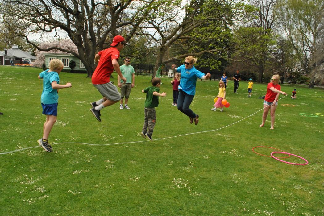 Health and Community People playing jump rope in a park