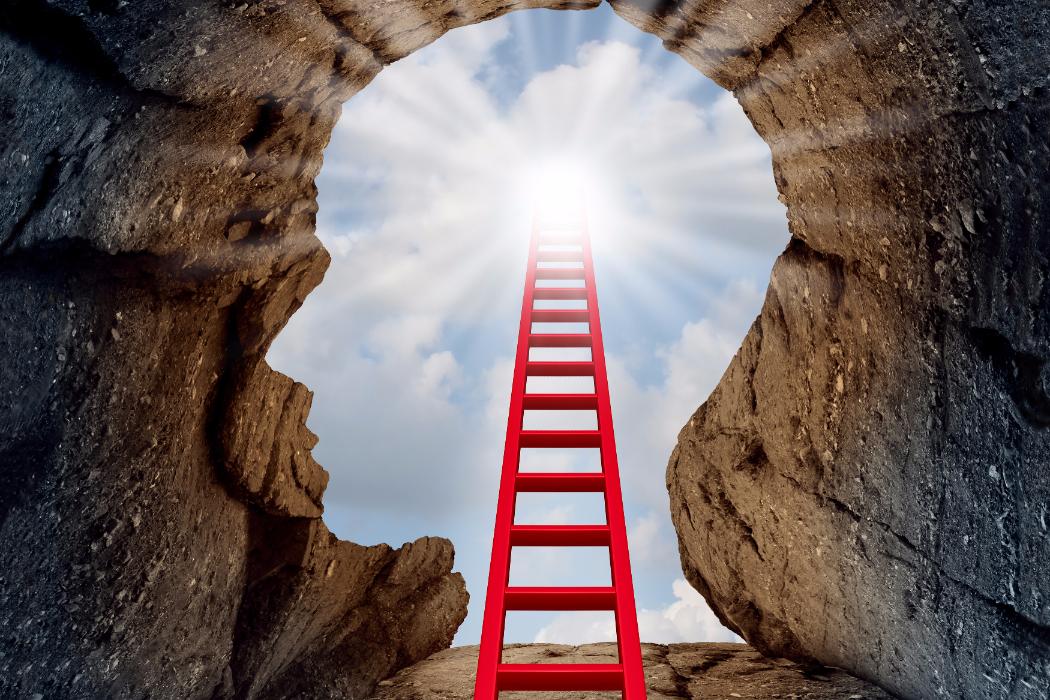 Industrial Psychology Red Ladder Ascending out of Head Shaped Hole