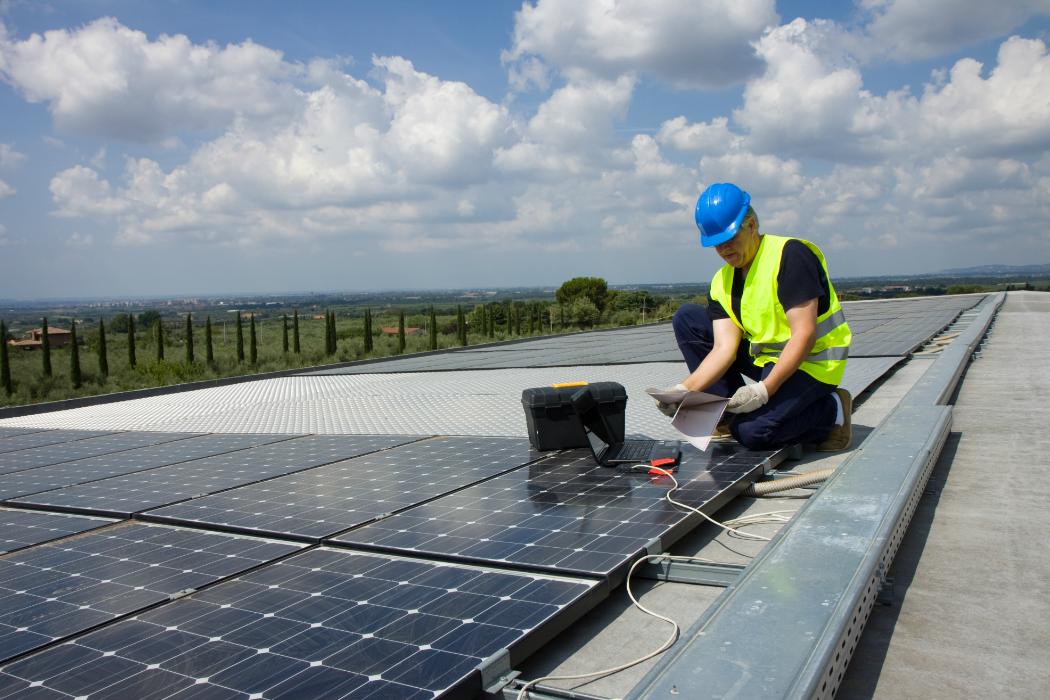 Renewable Energy Engineering Man Installing Solar Panel